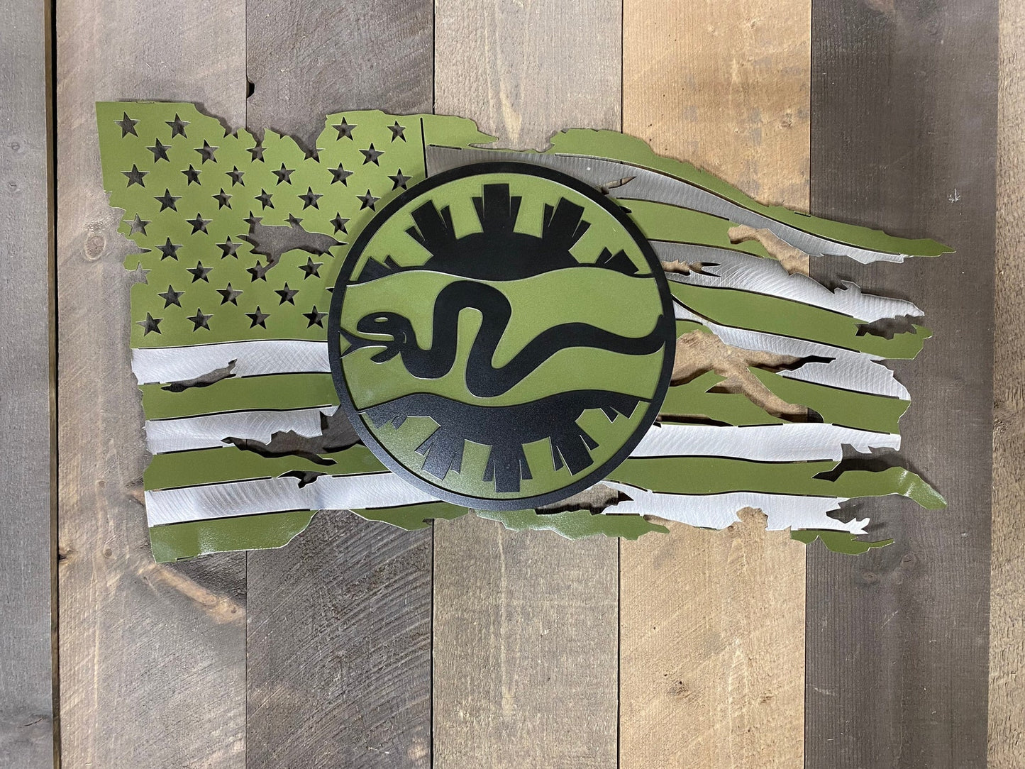 Metal American flag wall art with 116th Cavalry Brigade emblem raised on steel studs.