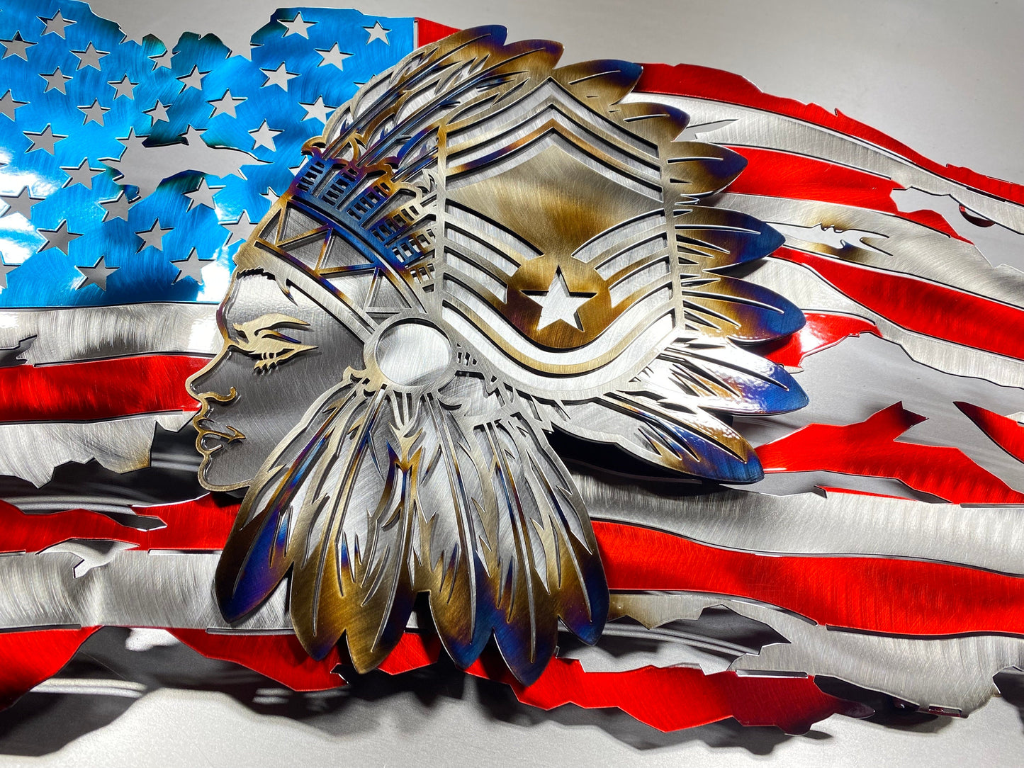 Tattered metal American flag with Female Chief Master Sergeant headdress
