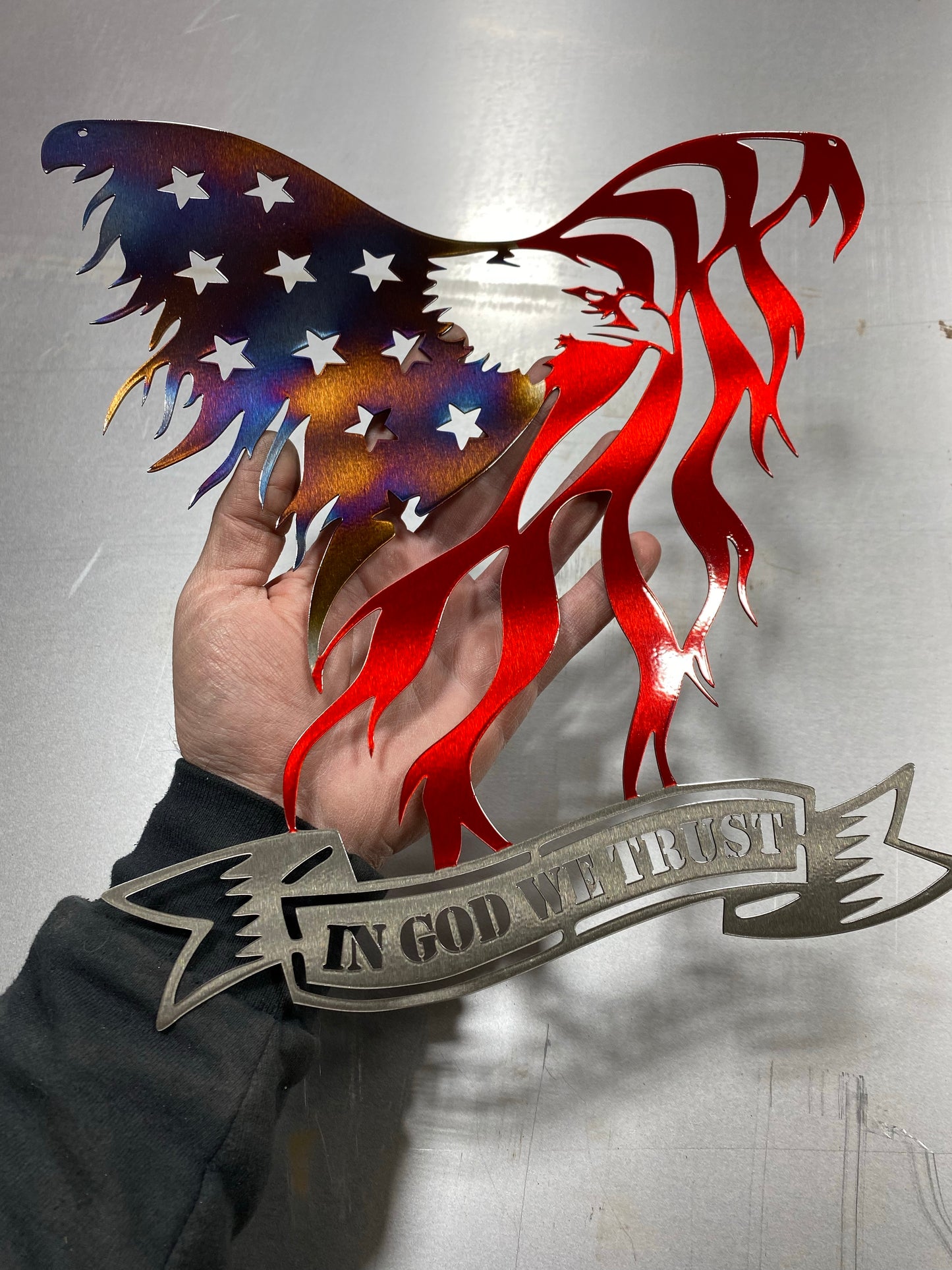 Metal eagle wall art with American flag design and In God We Trust engraving, handcrafted and powder-coated