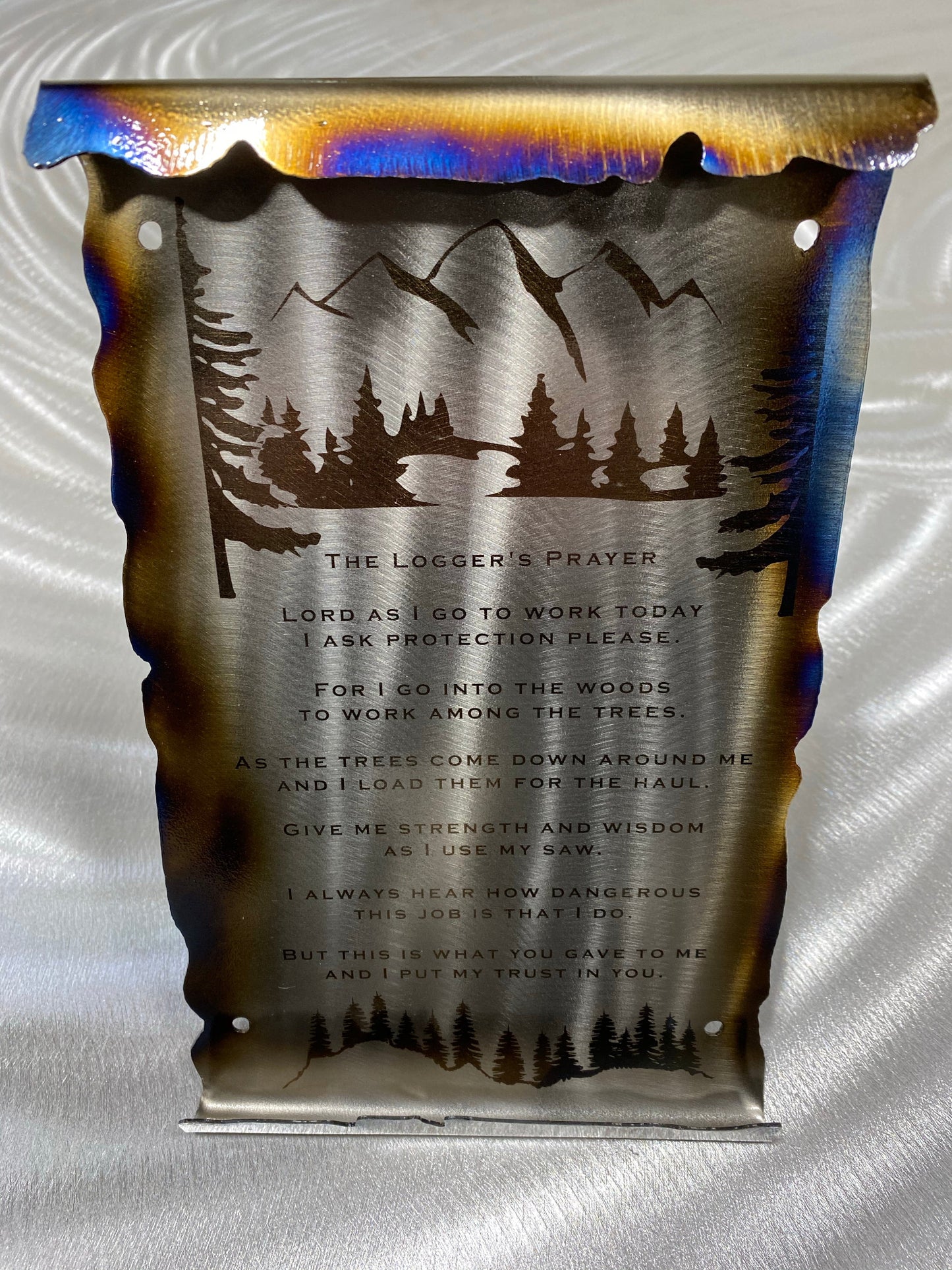 Loggers Prayer Scroll Sign, handcrafted metal wall art with laser-etched tree line and prayer, heat patina accents, and scroll edges by CnS CnC.