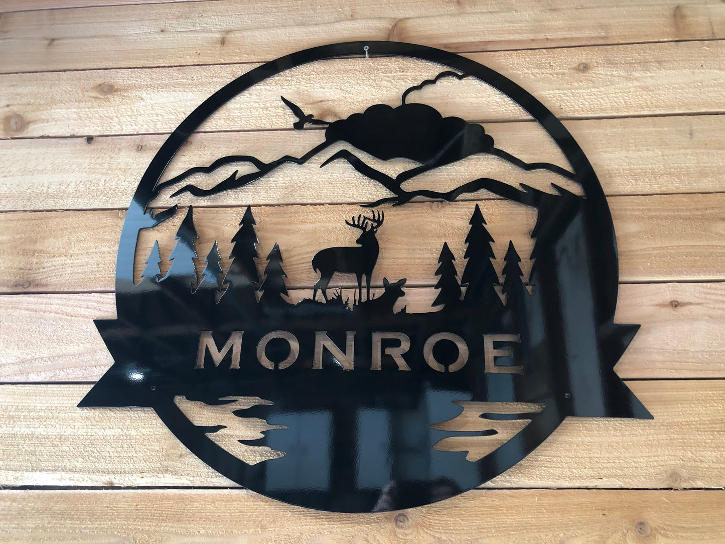 Nature-Themed Family Monogram, handcrafted metal sign personalized with a last name and animal silhouette, made from marine-grade aluminum