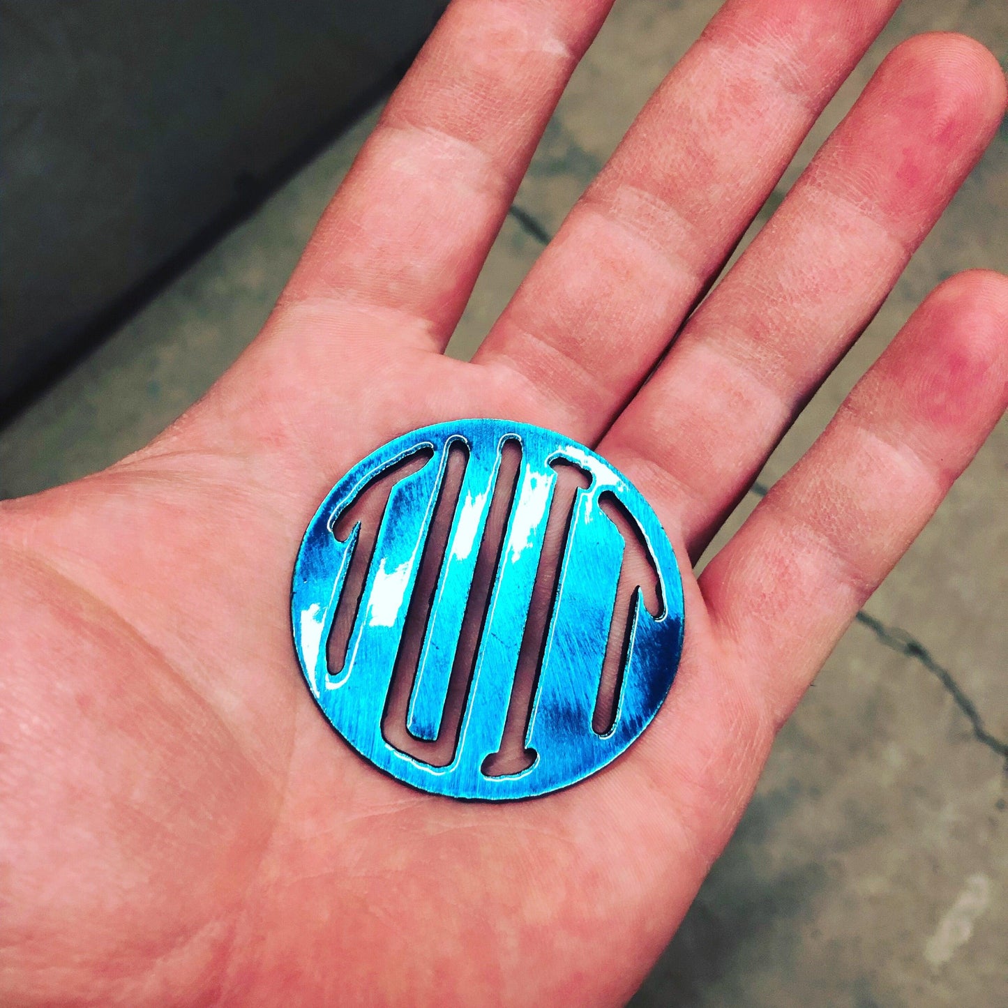 Round Tuit metal keychain, 2 inches, precision laser-cut and powder-coated for durability. A funny procrastinator gag gift.