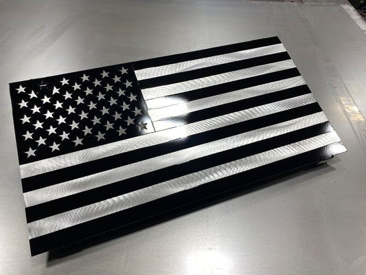 Black and silver American flag made from marine-grade aluminum with floating wall mount