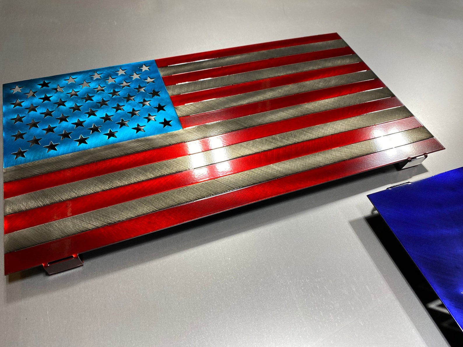 Distressed Standard American Flag with four-stage powder-coated finish, 24 inches wide, for patriotic indoor or outdoor display.