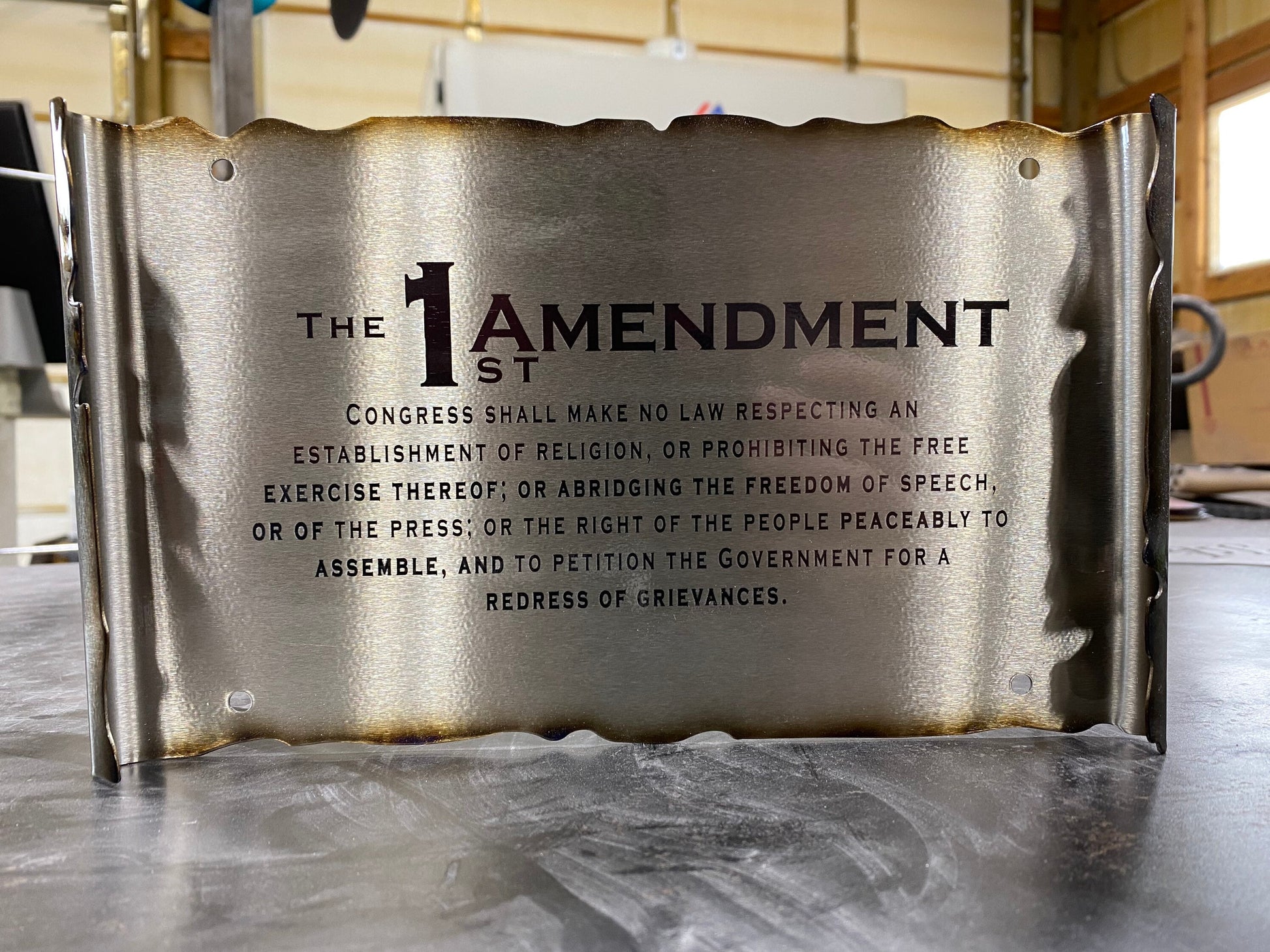 Laser engraved First Amendment scroll made from powder coated American steel with heat patina accents, available in two sizes