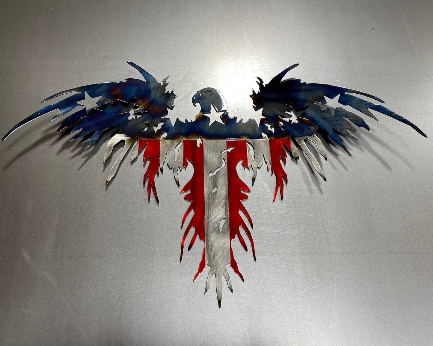 Heat Patina American Eagle Flag handcrafted from American steel with a wavy wing design and battle-worn American flag finish