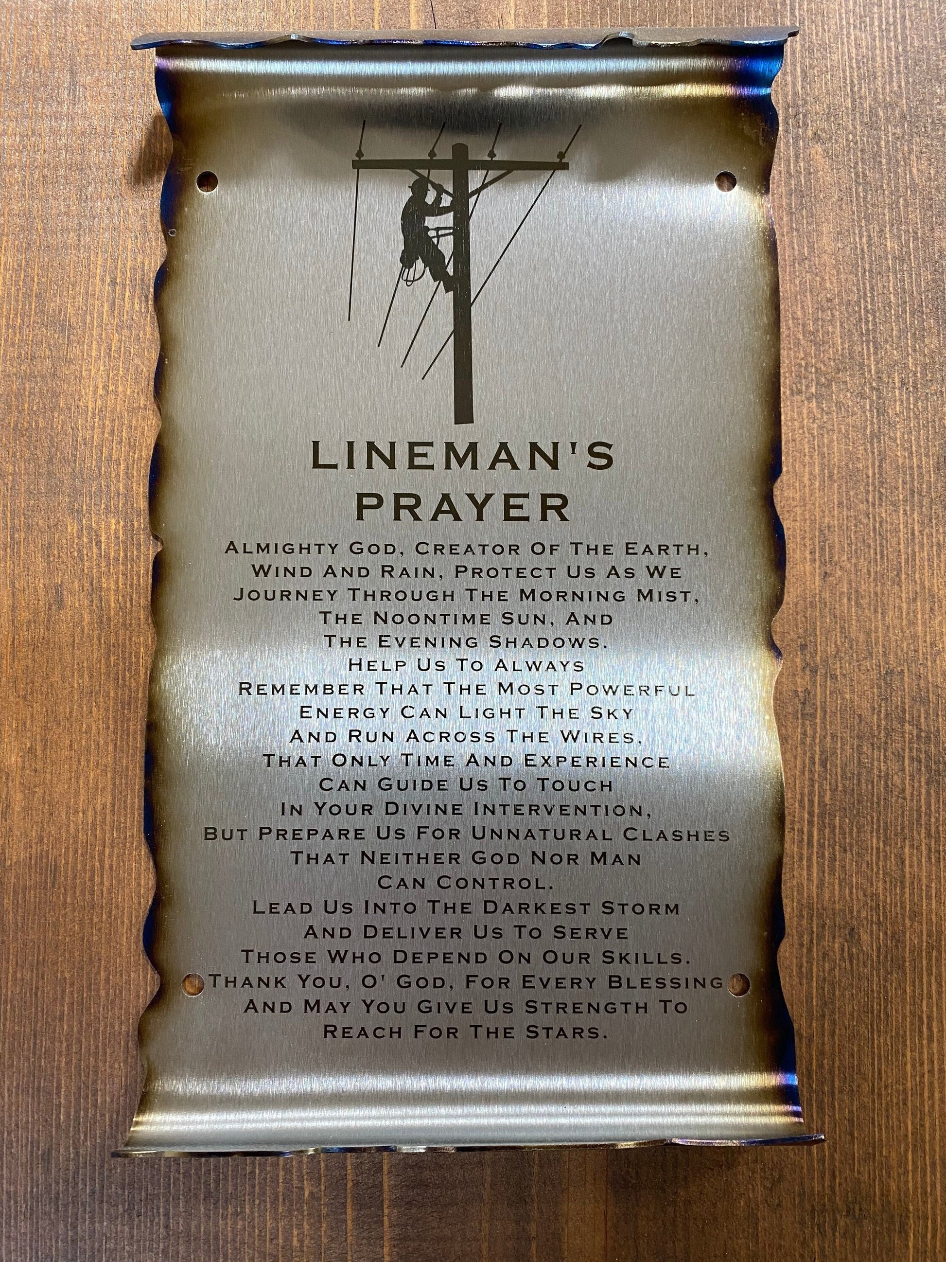 Handcrafted metal scroll with Lineman’s Prayer, formed 10-inch tall wall tribute for linemen and utility workers