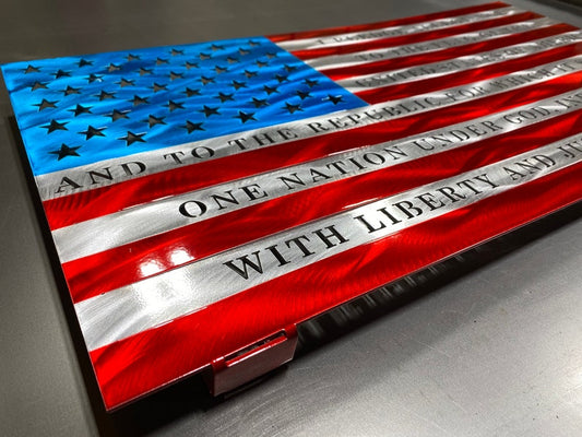 Metal American flag with Pledge of Allegiance in vibrant red, white, and blue

