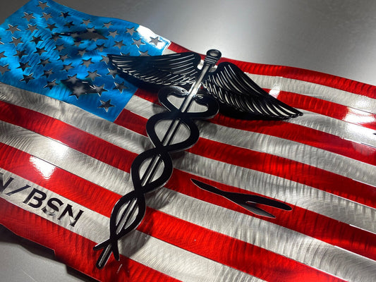 Metal American flag with raised Caduceus emblem for nurses