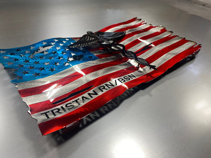 Metal American flag with raised Caduceus emblem for nurses