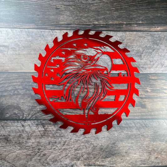 Rustic steel wall art with American flag and eagle inside a saw blade
