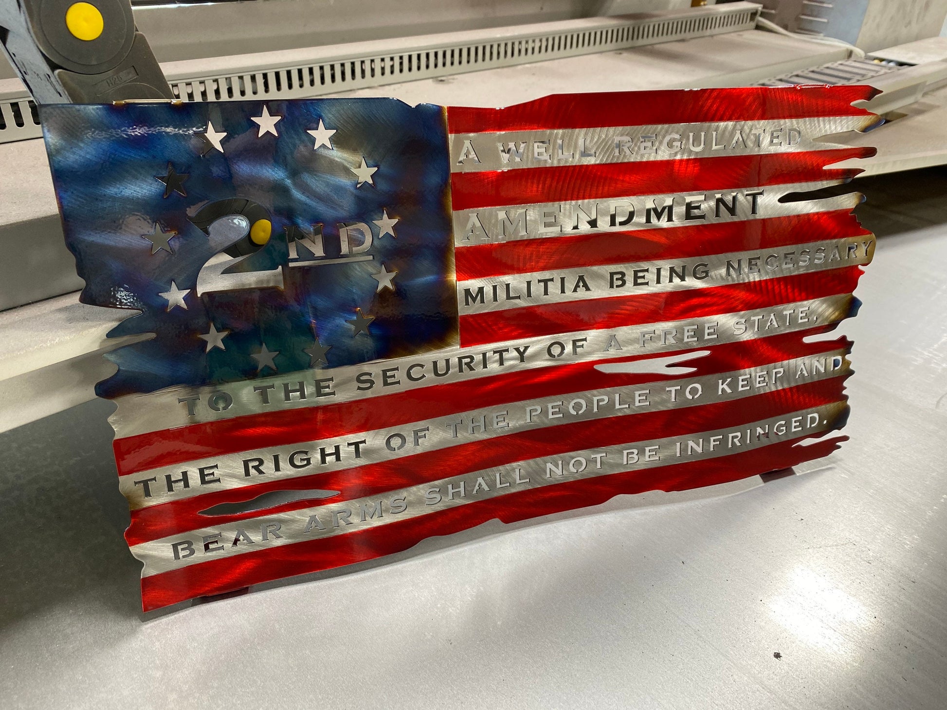 Tattered wavy metal American flag featuring “We the People” and “Come and Take It” phrases with candy red and heat finish.