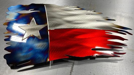 Tattered Texas flag made of metal with red, white, and blue powder coat
