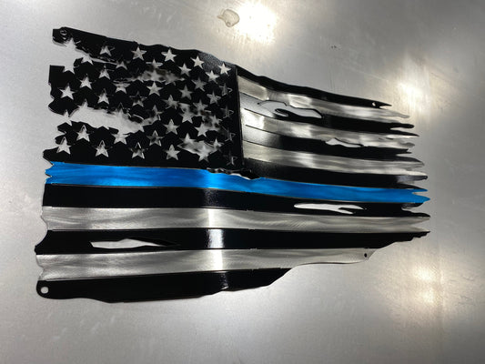 Metal American flag with blue line honoring law enforcement