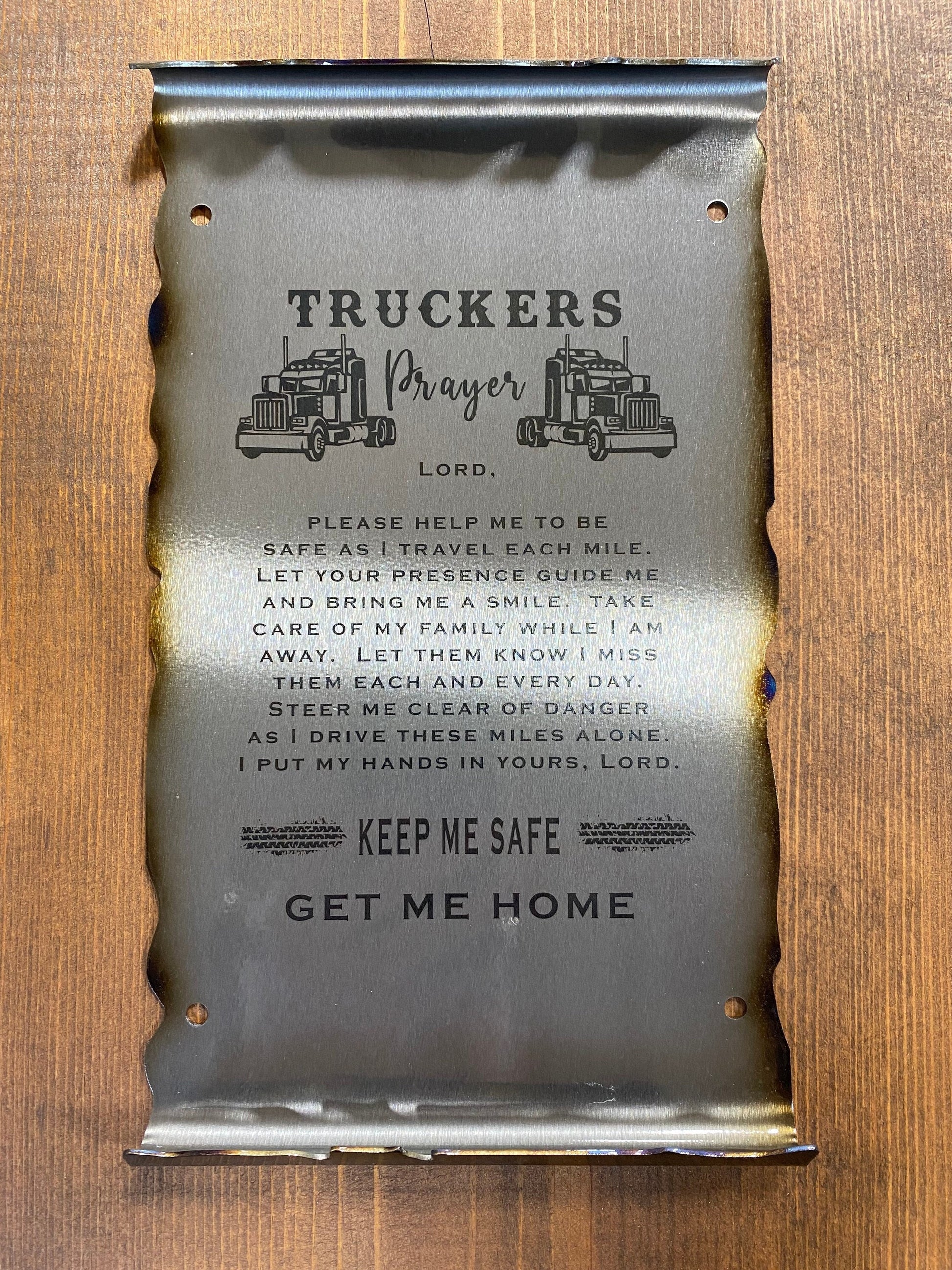 Handcrafted Truckers Prayer metal scroll sign with laser-etched text and heat-treated scroll edges