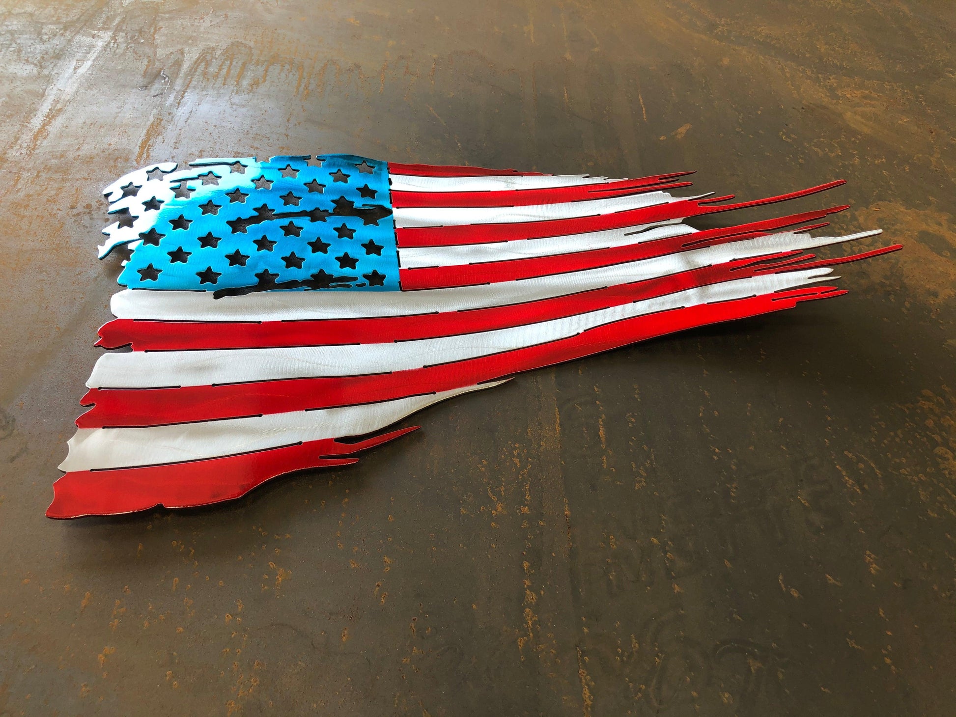 Battle worn and tattered American flag in handcrafted metal, patriotic wall art by CnS CnC