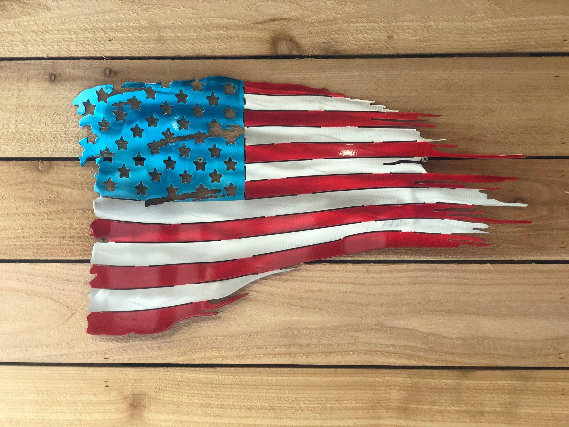 Battle worn and tattered American flag in handcrafted metal, patriotic wall art by CnS CnC