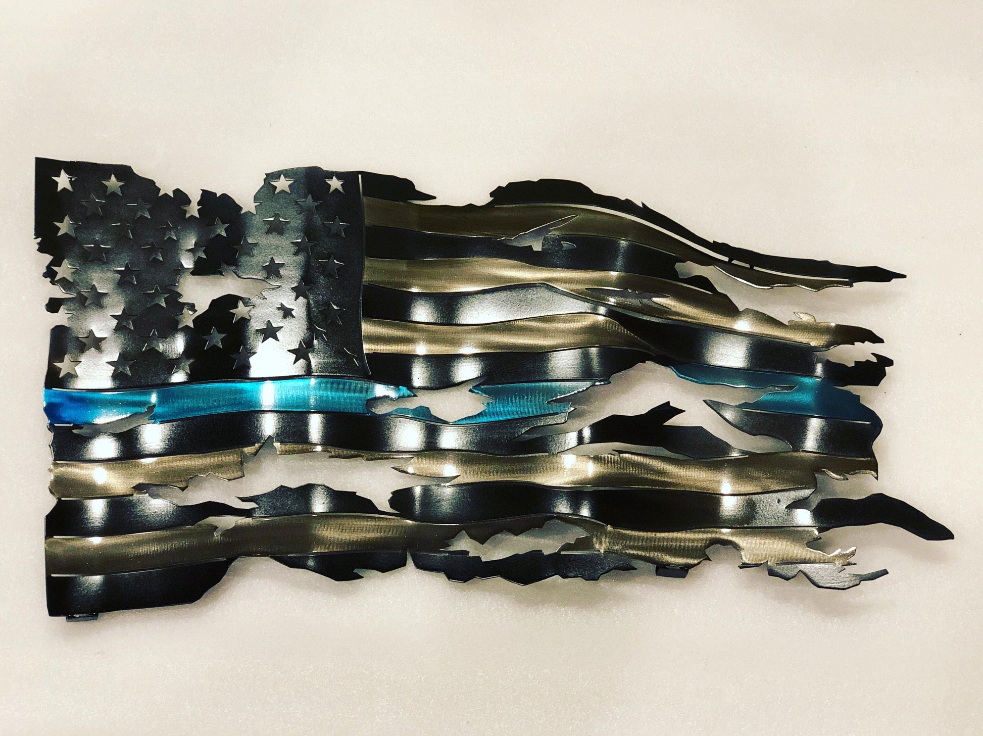 Distressed Thin Blue Line Flag with a rugged four-stage powder-coated finish, 24 inches wide, honoring law enforcement.
