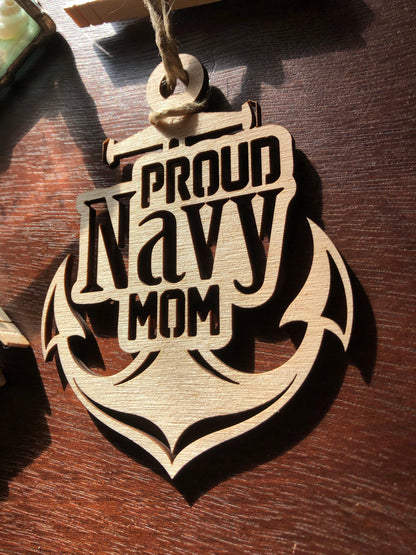 Proud Navy Mom ornament laser-cut from Baltic Birch, featuring intricate details and perfect for Christmas tree display.