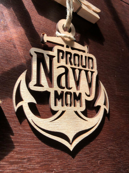 Proud Navy Mom ornament laser-cut from Baltic Birch, featuring intricate details and perfect for Christmas tree display.
