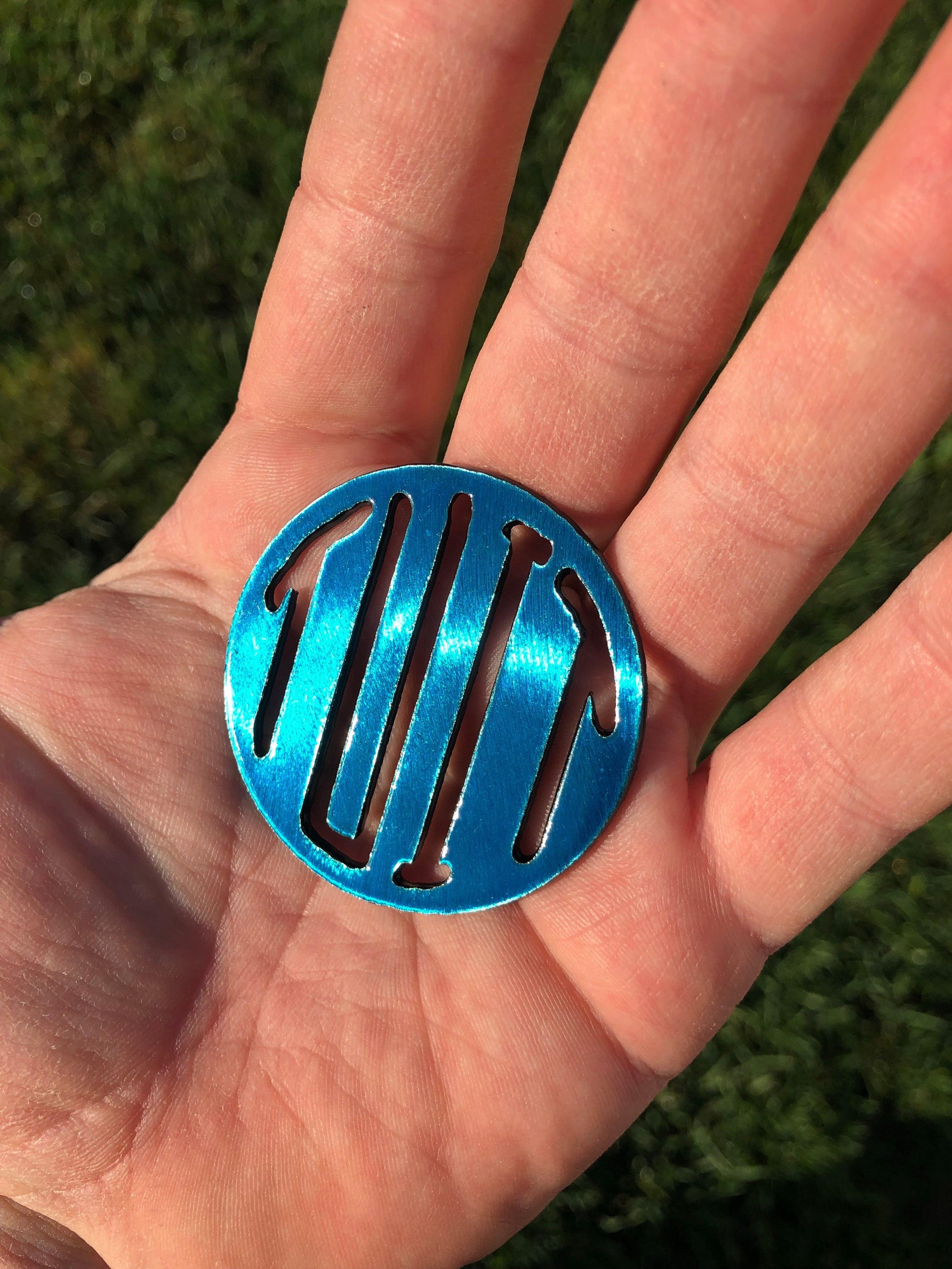 Round Tuit metal keychain, 2 inches, precision laser-cut and powder-coated for durability. A funny procrastinator gag gift.