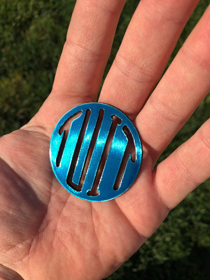 Round Tuit metal keychain, 2 inches, precision laser-cut and powder-coated for durability. A funny procrastinator gag gift.