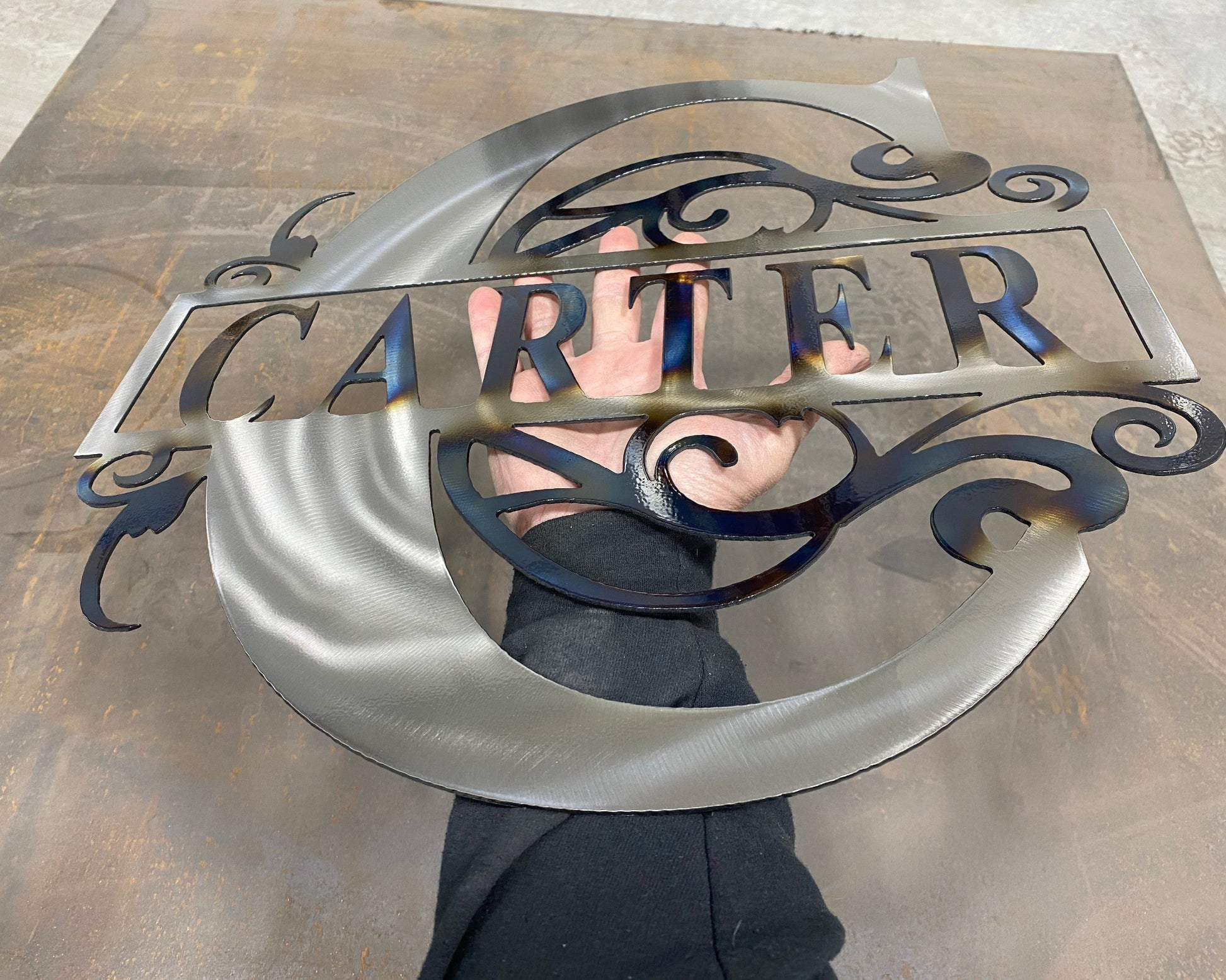  Split Letter Monogram, handcrafted metal family name sign with a heat-treated finish, personalized design, and clear powder coat by CnS CnC.