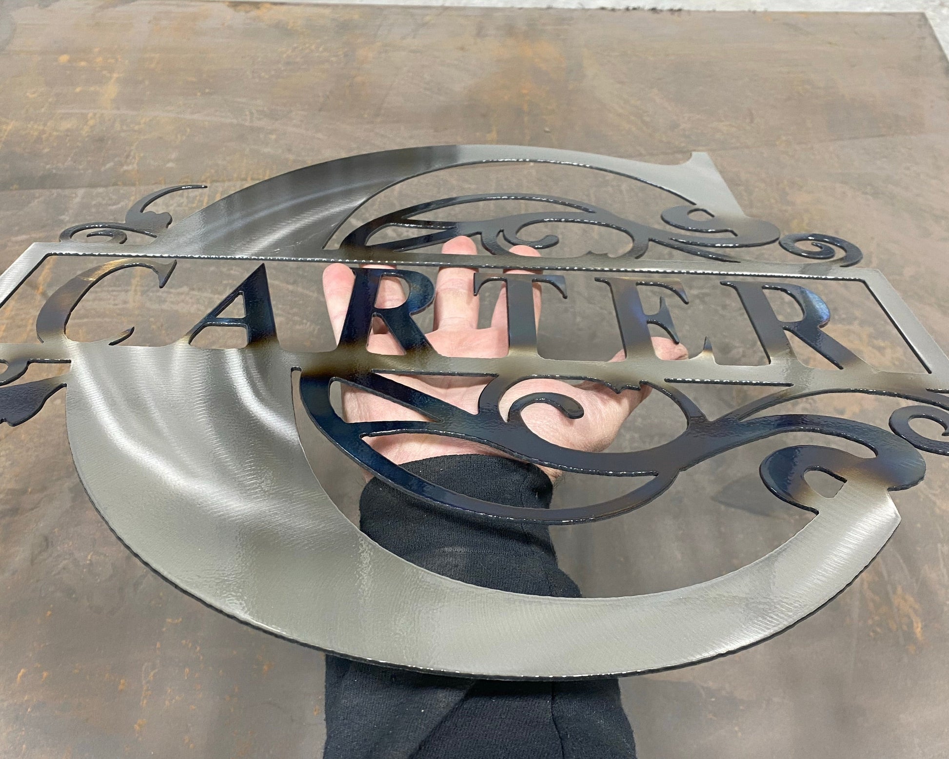  Split Letter Monogram, handcrafted metal family name sign with a heat-treated finish, personalized design, and clear powder coat by CnS CnC.