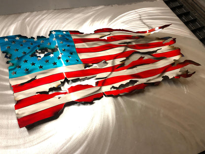 Handcrafted Wavy Battle Worn American Flag made from high-quality American steel with Candy Red and Blue powder coat, 24 inches wide.